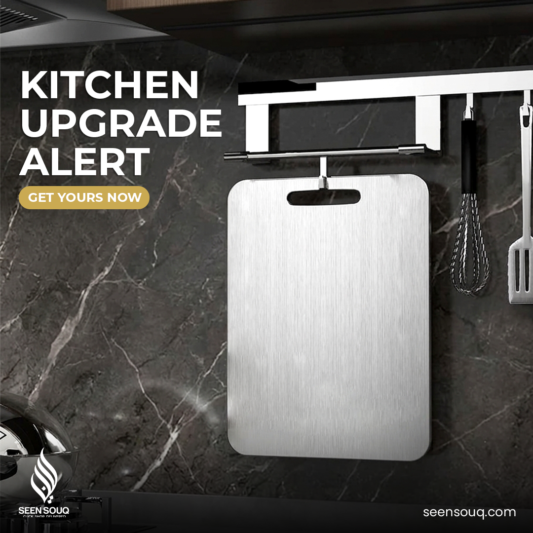 Metallic cutting board on a kitchen counter with promotional text and branding.